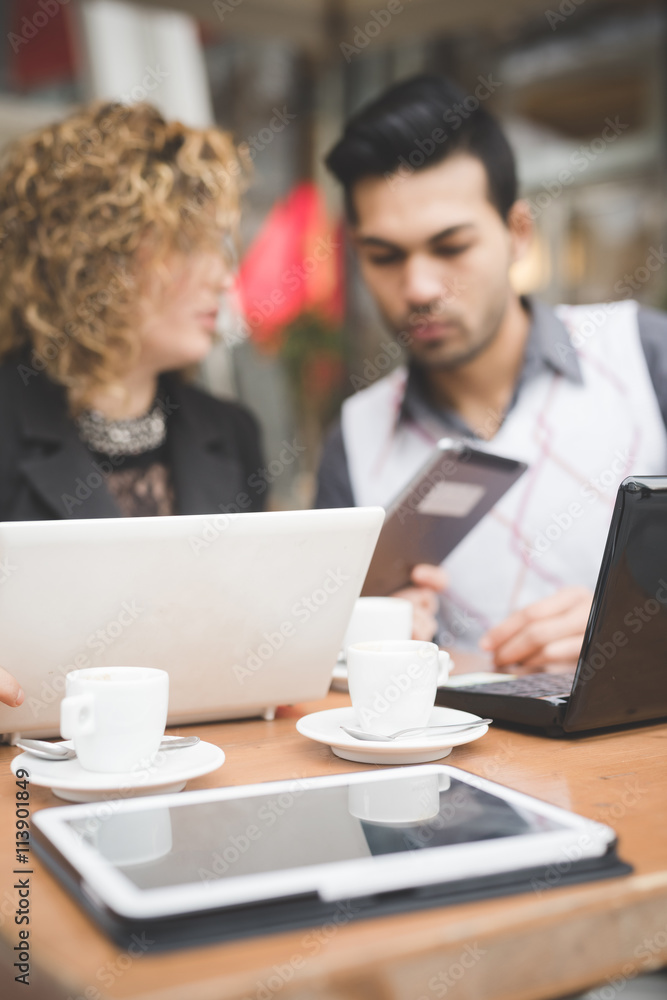 Fototapeta premium Multiracial business people working outdoor in town