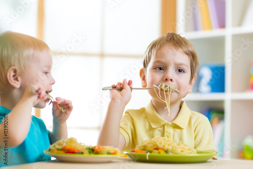 Child eating healthy food i...