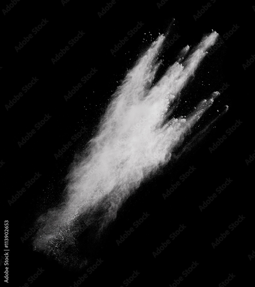 White powder explosion isolated on black background White powder explosion isolated on black background