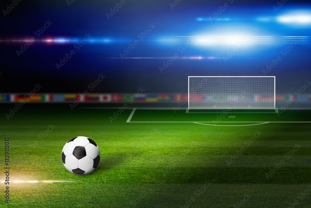 Naklejka Soccer ball on soccer stadium