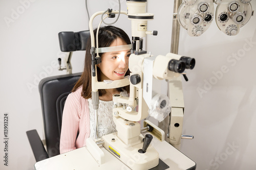 Woman is being examined of her eyesight