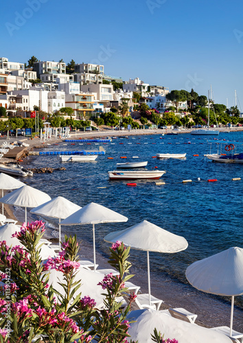 Fototapeta Naklejka Na Ścianę i Meble -  White Umbrellas on the Bodrum beach