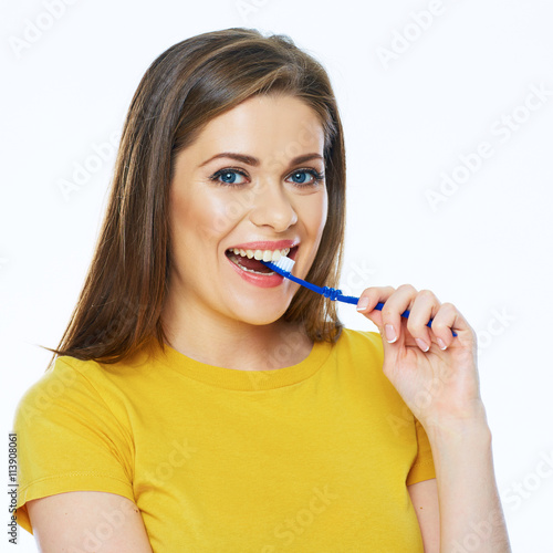 Beautiful woman isolated portrait with toothy brush. Healthy te