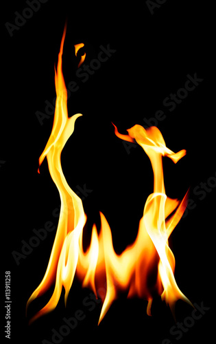 Vertical flames over black background