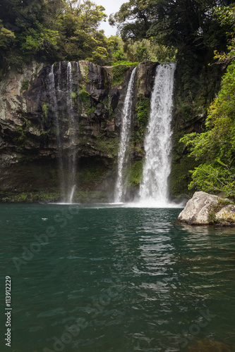 Cheonjiyeon Waterfall on Jeju Island in South Korea.