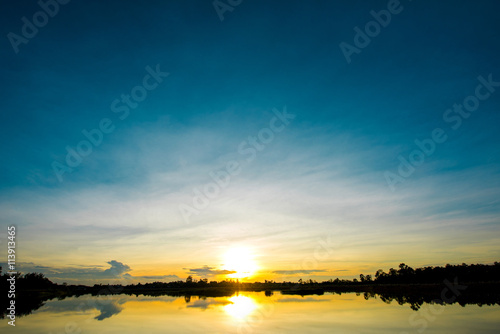 Beautiful sunset at the wetland, Breathtaking sunset with blue sky