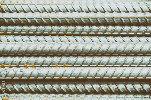 The deform bar,the deform bar pile on the construction site with the rusty in vintage scene.The steel bar pile with the rusty in classic scene.Close up of the steel bar with the rusty in vintage scene