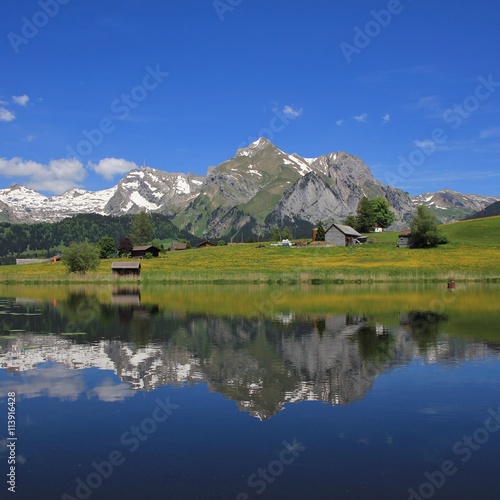 Mt Saentis and Alpstein range mirroring in lake Schwendisee