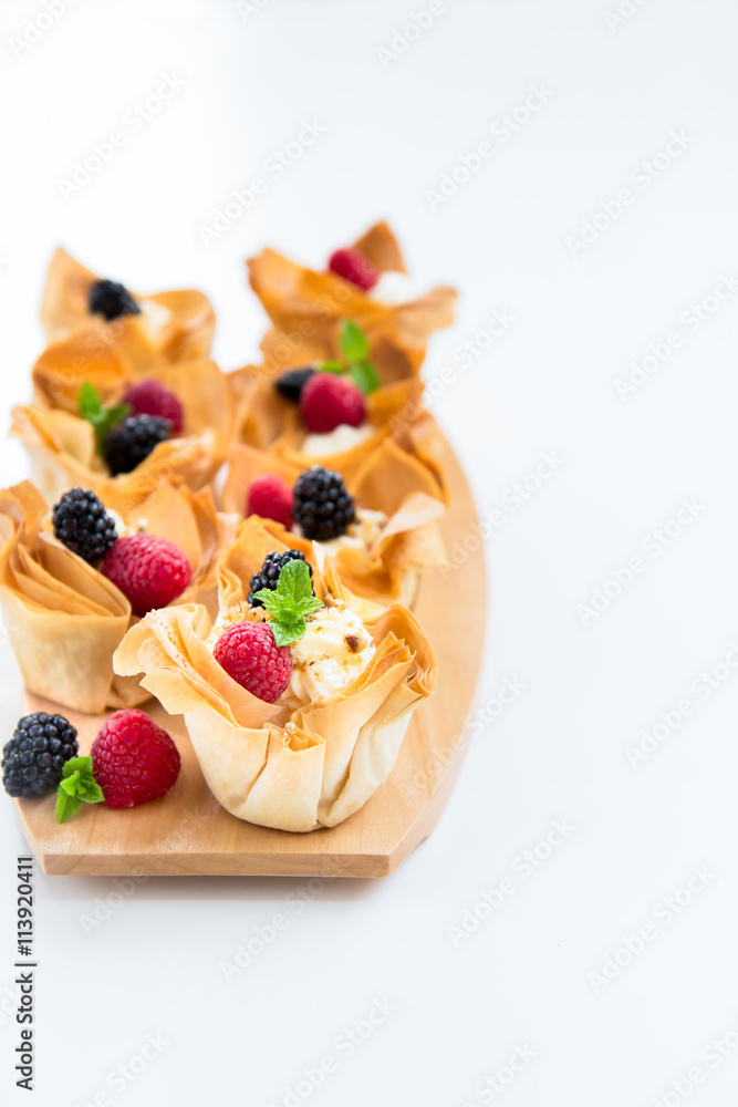 Homemade Filo Pastry Baskets with Mascarpone Cream and Berries Homemade Filo Pastry Baskets with Mascarpone Cream and Berries