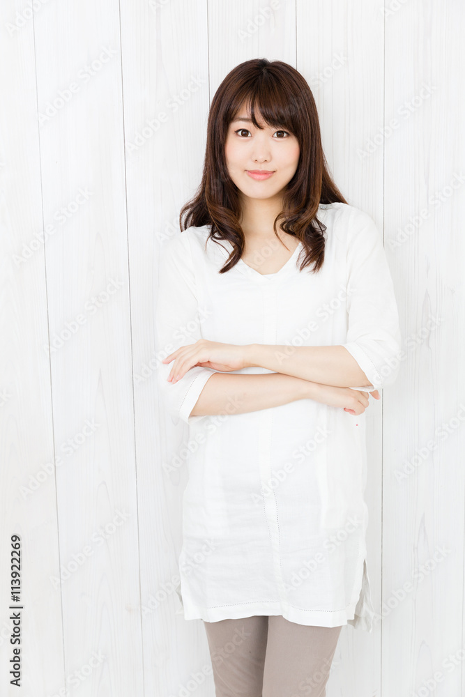 portrait of attractive asian woman on wood background portrait of attractive asian woman on wood background