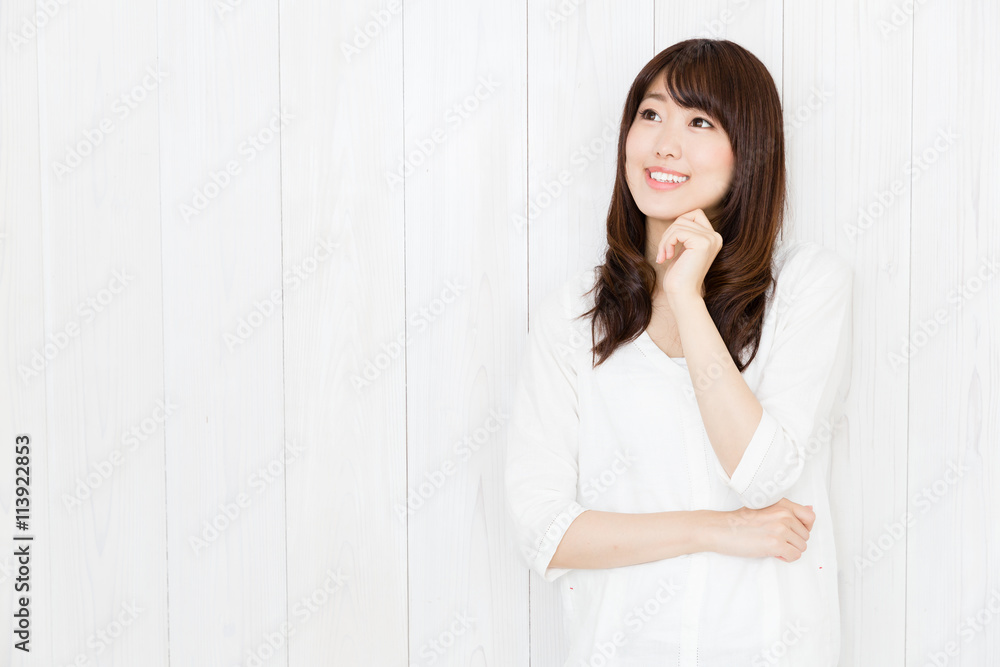 portrait of attractive asian woman on wood background portrait of attractive asian woman on wood background