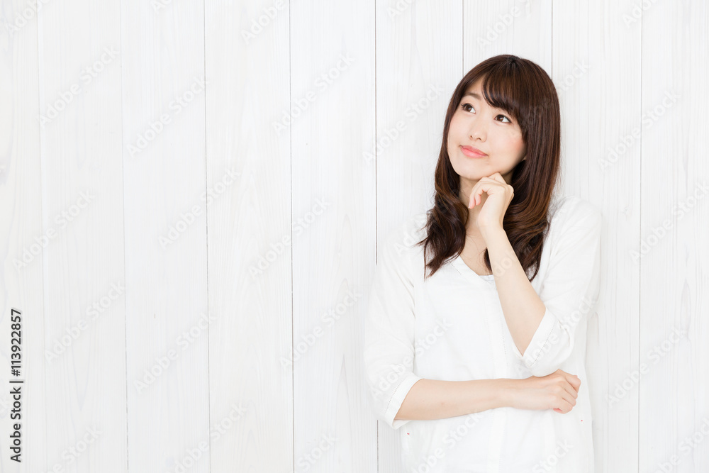 portrait of attractive asian woman on wood background portrait of attractive asian woman on wood background