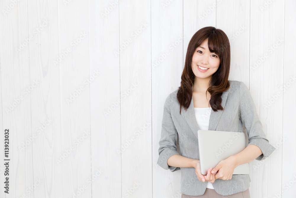 portrait of asian businesswoman on wood background portrait of asian businesswoman on wood background