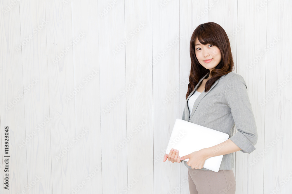portrait of asian businesswoman on wood background portrait of asian businesswoman on wood background