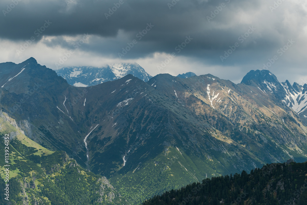 dramatic sky and fog over hight peaks in Tatra