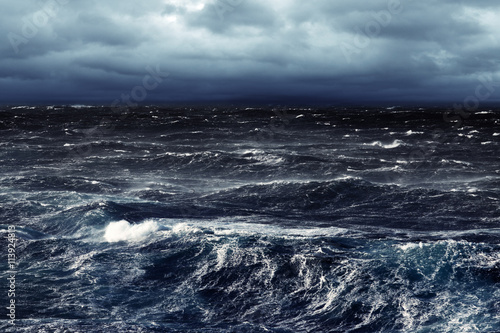 Stormy Winds Darkening Day and Breaking Waves