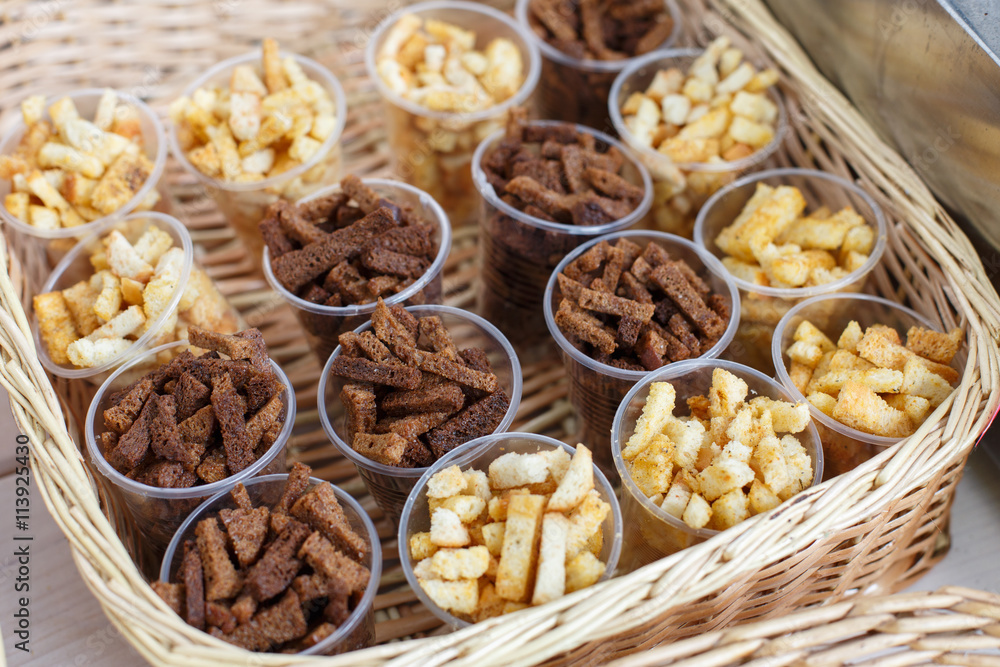 Croutons snack in plastic cups for party Croutons snack in plastic cups for party
