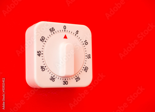 Kitchen timer cooking ring counter at the red wall