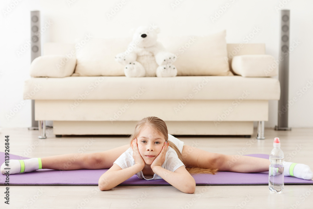 Little girl practicing yoga Little girl practicing yoga