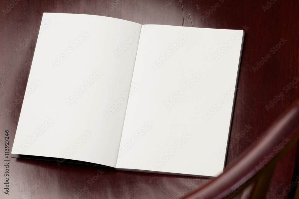 Blank spread, open book on old wooden table. Blank spread, open book on old wooden table.