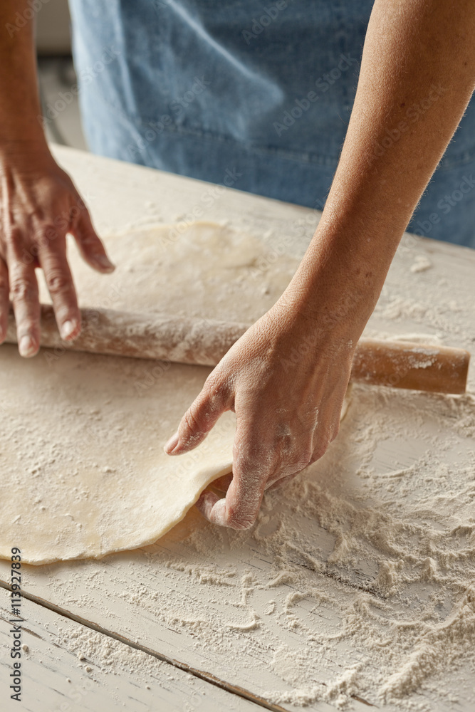 Elevated view of baker preparing pastry dough Elevated view of baker preparing pastry dough