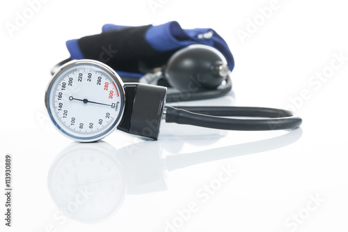 Blood pressure measuring medical equipment on white background - a tonometer photo