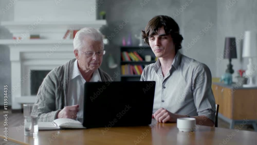 Grandson Teaching grandfather How to Use a laptop PC Grandson Teaching grandfather How to Use a laptop PC