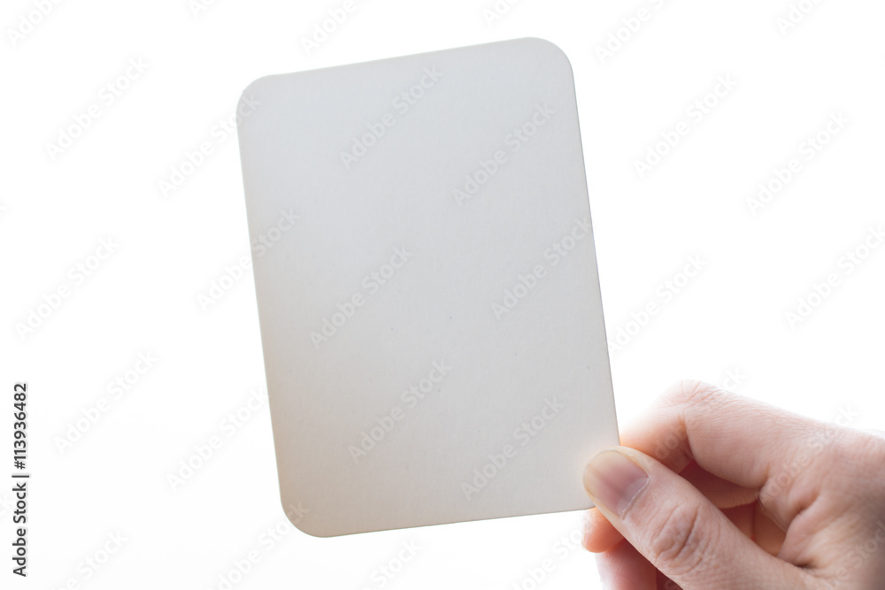 woman's hand holding white blank paper woman's hand holding white blank paper