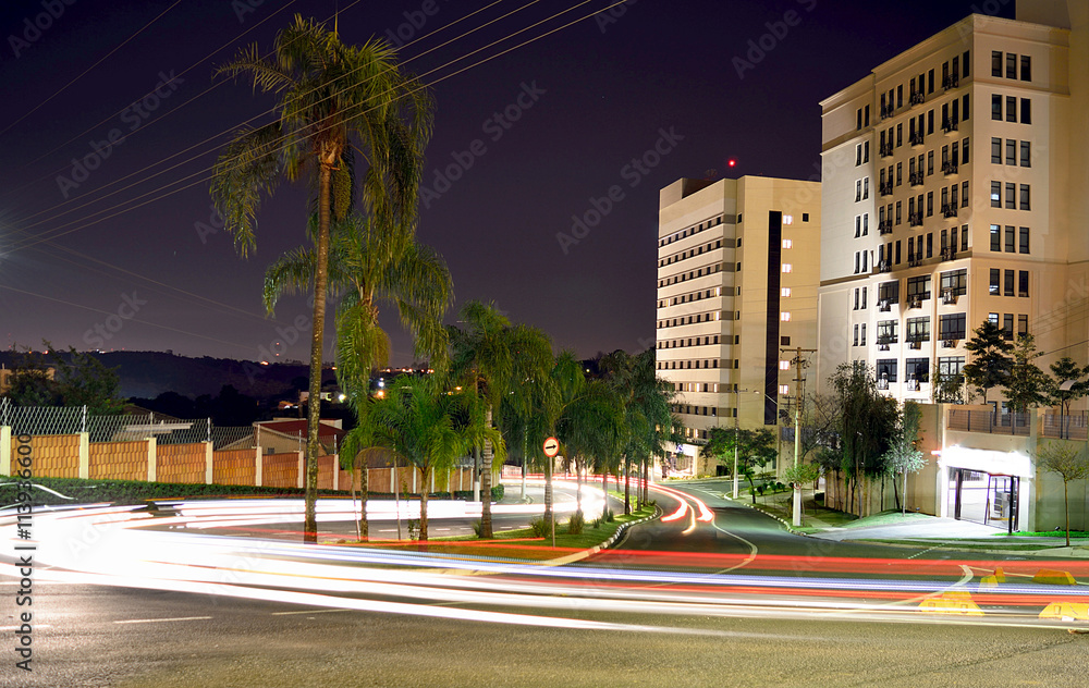 City Scene with buildings and car light trails