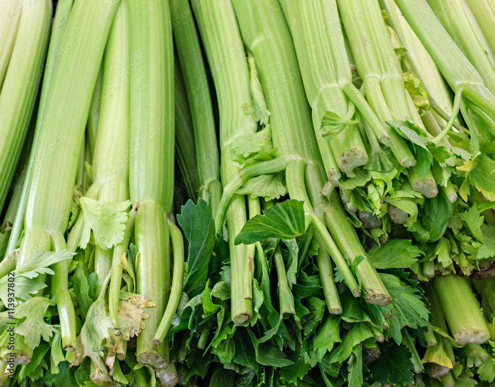 Organic fresh celery at a local farmers market Organic fresh celery at a local farmers market