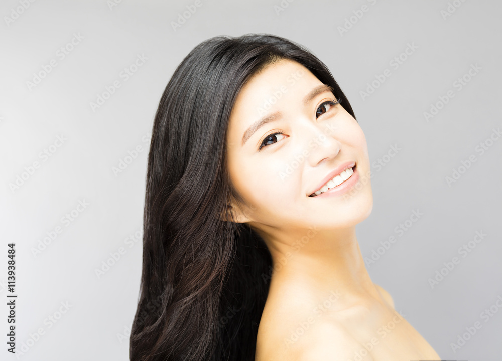 smiling young Woman with Long and Healthy Black Hair smiling young Woman with Long and Healthy Black Hair