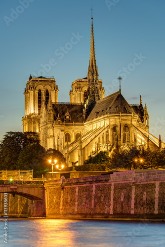 The famous Notre Dame cathedral in Paris after sunset
