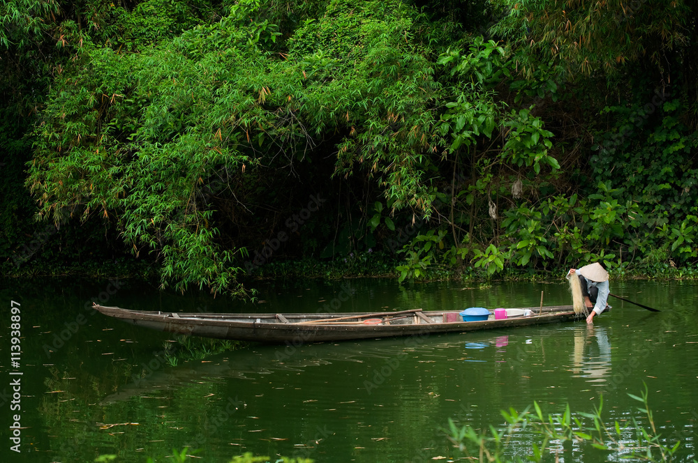 Unidentified fishers in Hue, Vietnam. Hue city is a UNESCO World Heritage site. Unidentified fishers in Hue, Vietnam. Hue city is a UNESCO World Heritage site.