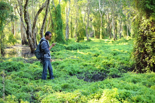 Man and Green Forest in Rayong at Thailand