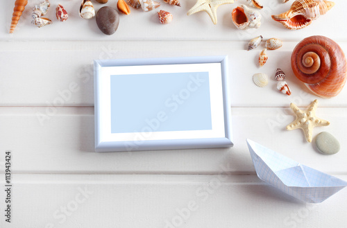 Frame shells sea summer vacation concept wood background
