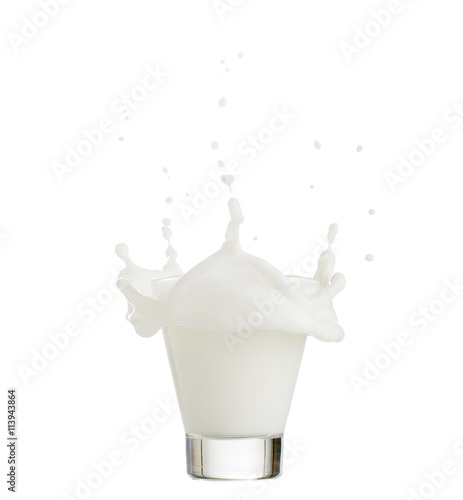 milk splash in glass isolated on white background