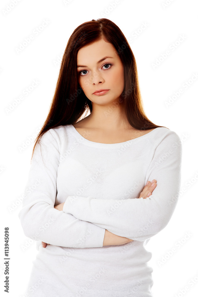 Annoyed young woman with arms crossed Annoyed young woman with arms crossed