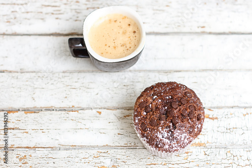 chocolate muffin and cup of coffee