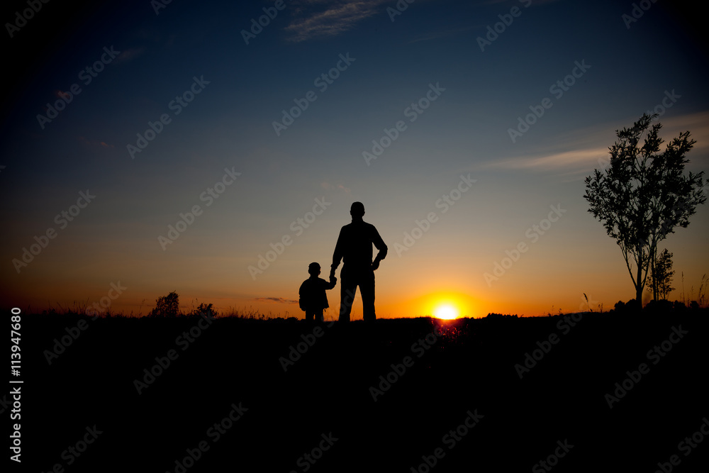 Father and son looking for future, silhouette concept