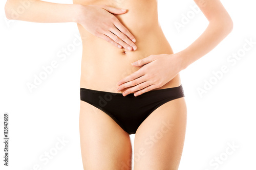 Stomachache  touching with hand  isolated  white background