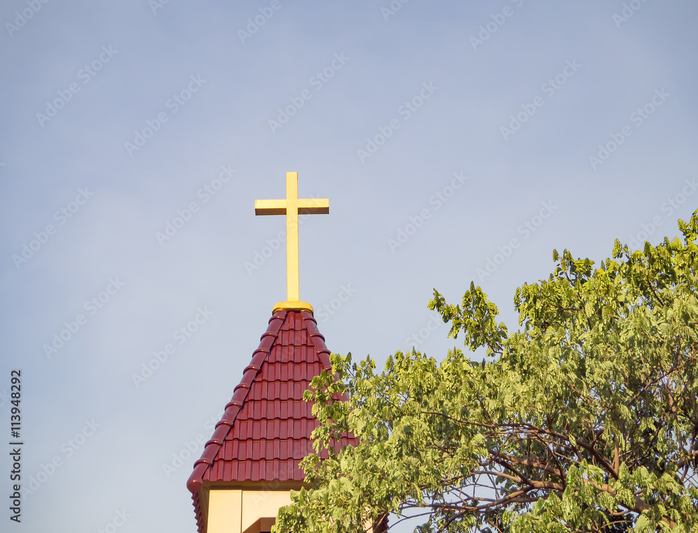 Cross over roof Christian