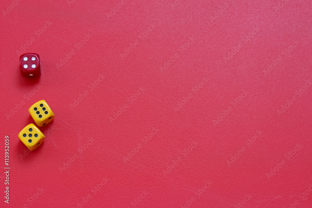 Three dices for the game of dice on a red table. Background for the Board Games with dice. Chance or Lucky case concept. Three dices for the game of dice on a red table. Background for the Board Games with dice. Chance or Lucky case concept.