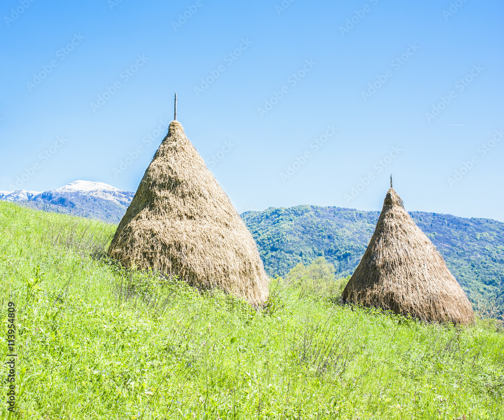 Traditional haystack of mountain villages. StockFoto Adobe Stock