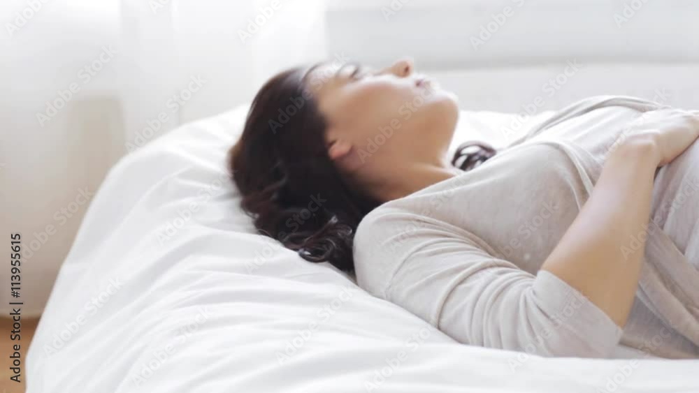 happy pregnant woman touching her tummy at home 41 happy pregnant woman touching her tummy at home 41
