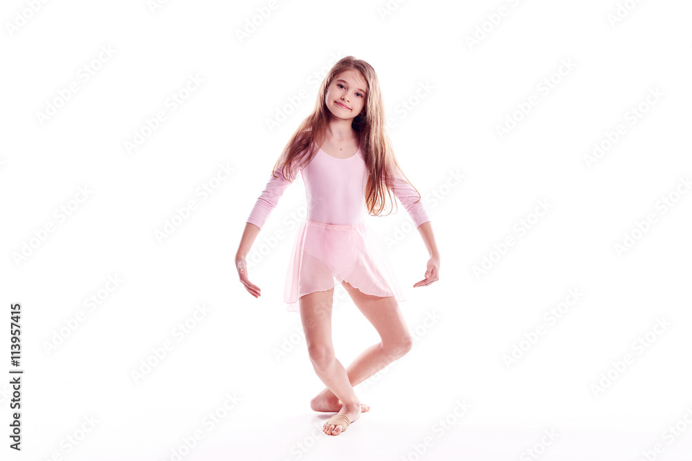 Young excited girl jumping in the studio