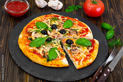 Pizza with Mushroom, Cheese, Mozzarella, Olives and Basil