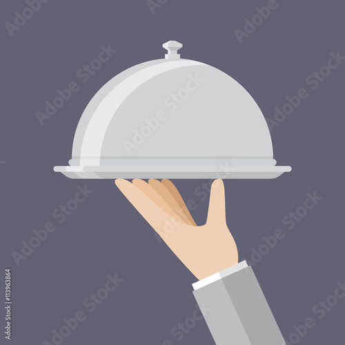Waiter hand holding silver serving tray