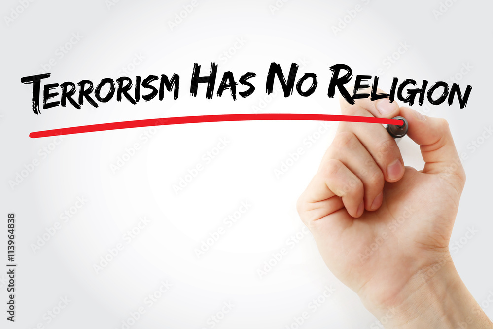 Fototapeta premium Man's hand writing terrorism has no religion on white background
