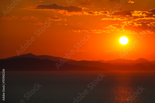 Amazing bright sunset at sea © Rawf8
