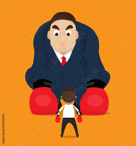 Businessman have the courage to fight the giant.businessman boxing against a big boss.